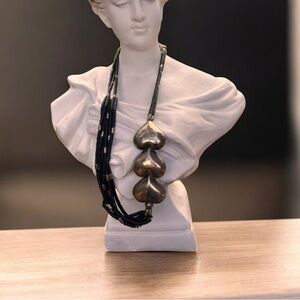 Vintage chunky statement black necklace with 3 silver heart on a side